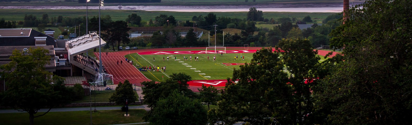 Acadia University football field at sunset