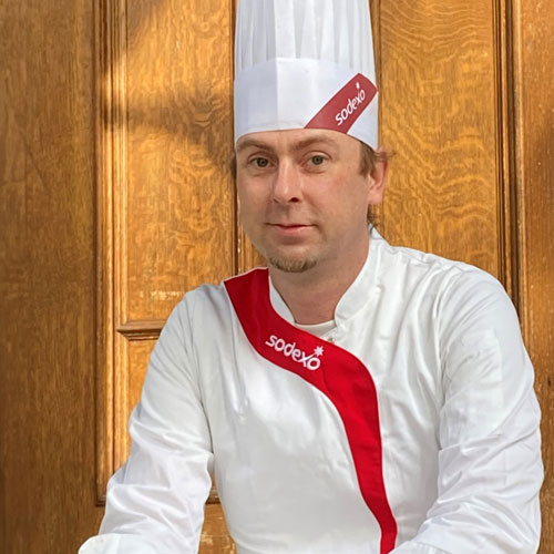 Chef portrait in traditional chef hat